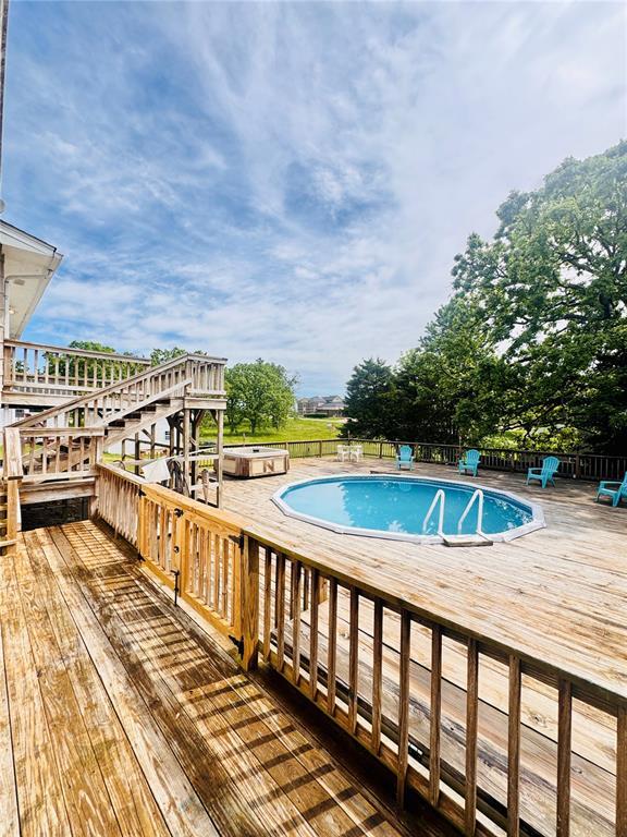 1202 S Mildred Ave, Salem, MO 65560 - view of swimming pool with a wooden deck