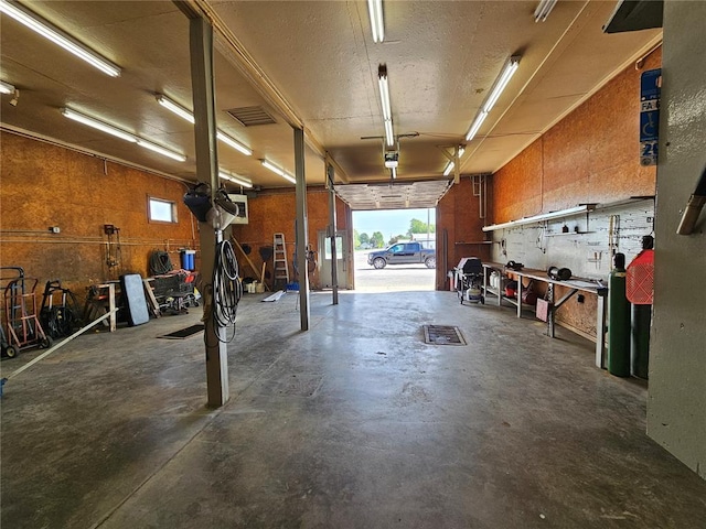 103 E Broad St, Raymond, IL 62560 - garage featuring a workshop area