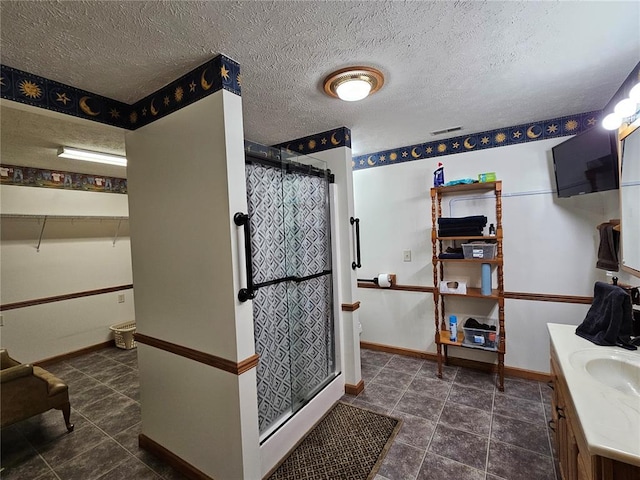 103 E Broad St, Raymond, IL 62560 - full bathroom with a stall shower, baseboards, vanity, and toilet