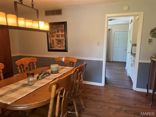 414 Hillcrest Dr, Sullivan, MO 63080 - dining area with dark wood finished floors and baseboards