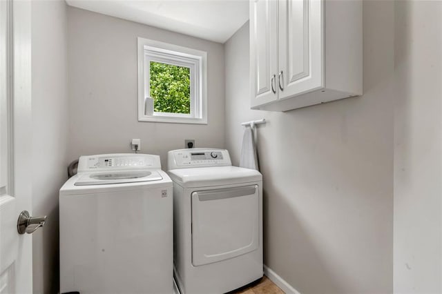 3481 New Town Lake Dr, Saint Charles, MO 63301 - laundry area with cabinet space and independent washer and dryer