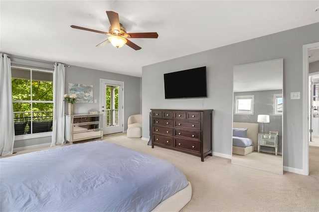 3481 New Town Lake Dr, Saint Charles, MO 63301 - carpeted bedroom featuring access to exterior, baseboards, and ceiling fan
