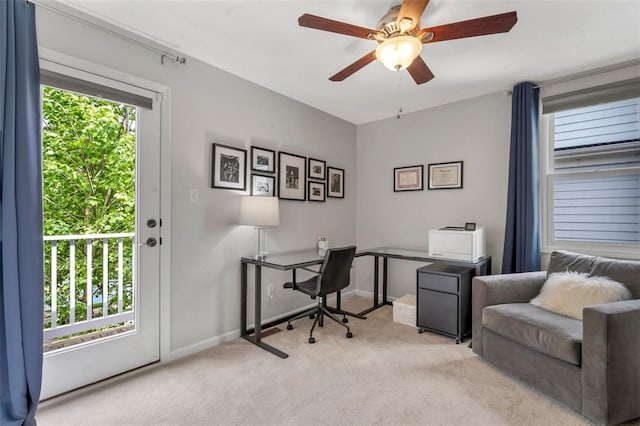 3481 New Town Lake Dr, Saint Charles, MO 63301 - office area featuring light colored carpet, a ceiling fan, and baseboards