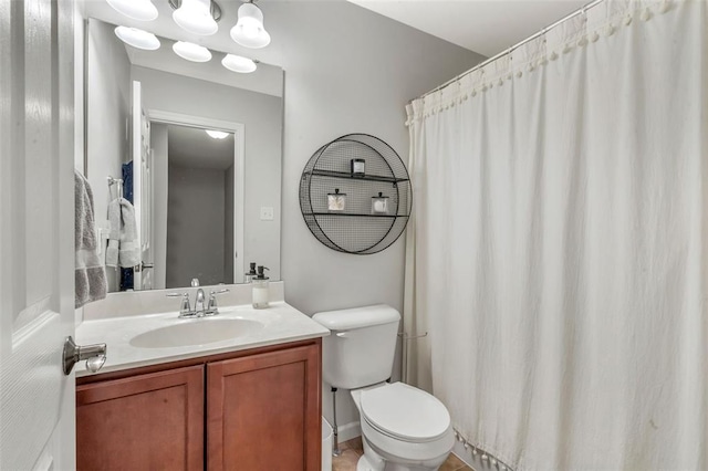 3481 New Town Lake Dr, Saint Charles, MO 63301 - bathroom with vanity, toilet, and a shower with curtain