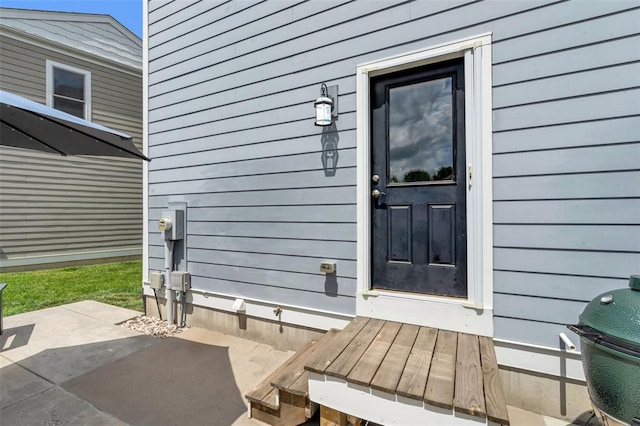 3481 New Town Lake Dr, Saint Charles, MO 63301 - doorway to property with a patio area