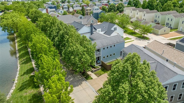 3481 New Town Lake Dr, Saint Charles, MO 63301 - aerial view of residential area with a large body of water