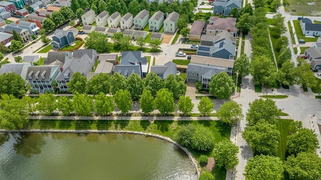 3481 New Town Lake Dr, Saint Charles, MO 63301 - aerial view of residential area with a large body of water