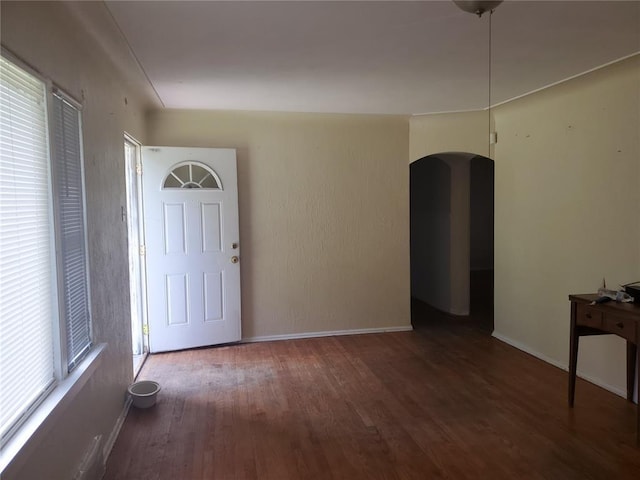 768 Leon St, Cahokia, IL 62206 - foyer entrance with arched walkways, wood finished floors, and baseboards