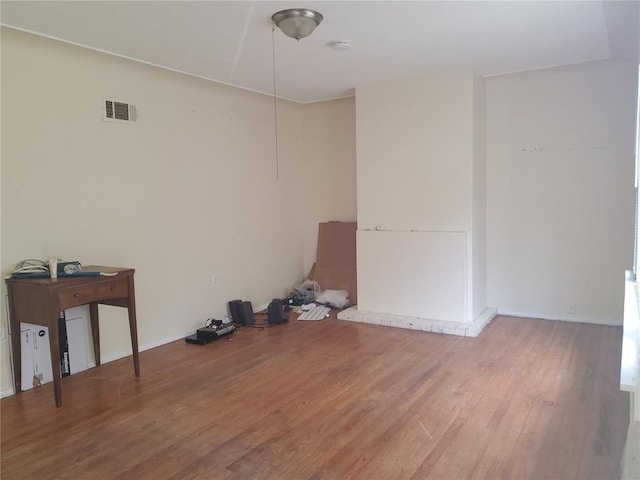 768 Leon St, Cahokia, IL 62206 - unfurnished room with wood finished floors, baseboards, and a smoke detector