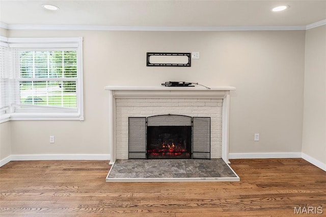 6446 Old Collinsville Rd, Ofallon, IL 62269 - detailed view of ornamental molding, wood finished floors, recessed lighting, and a fireplace