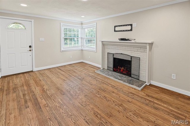 6446 Old Collinsville Rd, Ofallon, IL 62269 - unfurnished living room with a fireplace, wood finished floors, crown molding, and recessed lighting