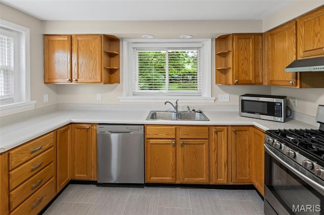 6446 Old Collinsville Rd, Ofallon, IL 62269 - kitchen with appliances with stainless steel finishes, open shelves, under cabinet range hood, and light countertops