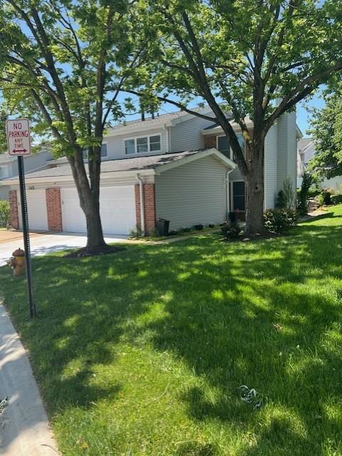 341 Fox Village Ct, Ballwin, MO 63021 - view of front of home with a front lawn and brick siding