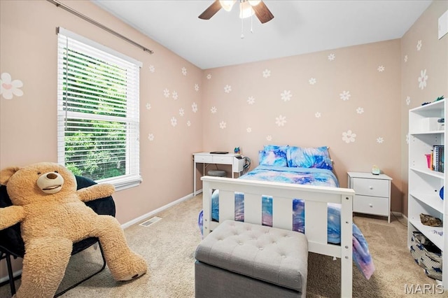 7413 Cinnamon Teal Dr, Ofallon, MO 63368 - bedroom featuring carpet flooring, multiple windows, a ceiling fan, and wallpapered walls