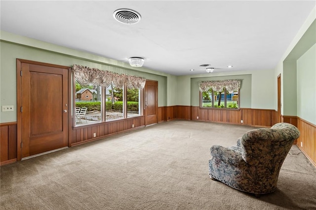 814 Pardee Rd, Godfrey, IL 62035 - unfurnished room featuring wainscoting, carpet flooring, and wood walls