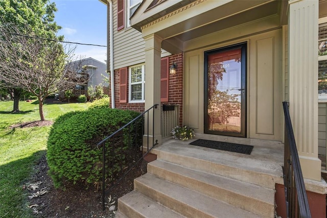 1491 Bobolink Pl, Brentwood, MO 63144 - entrance to property featuring brick siding and a yard