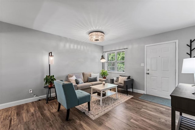 1491 Bobolink Pl, Brentwood, MO 63144 - living room featuring wood finished floors and baseboards