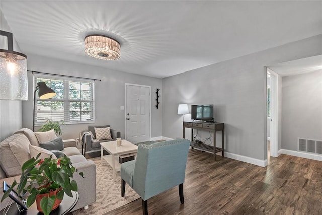 1491 Bobolink Pl, Brentwood, MO 63144 - living area with wood finished floors and baseboards
