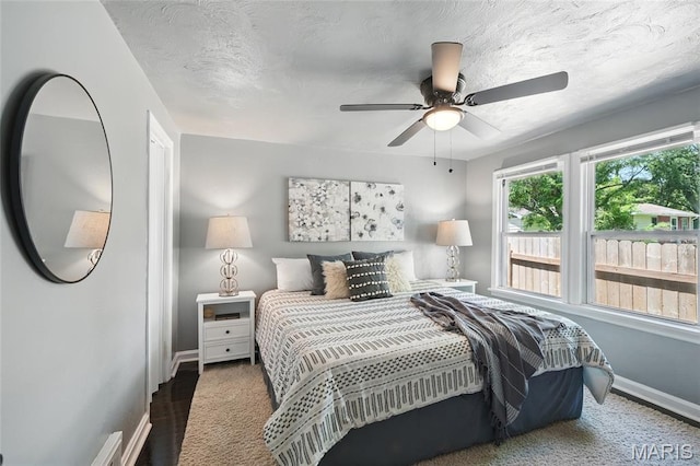 41 S Dellwood Ave, Saint Louis, MO 63135 - bedroom featuring baseboards, a ceiling fan, and a textured ceiling