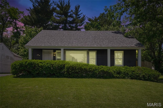 41 S Dellwood Ave, Saint Louis, MO 63135 - view of front of property with a shingled roof and a front lawn