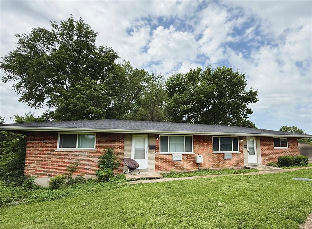 11204 Liana Ln Unit 204-206, Saint Ann, MO 63074 - single story home featuring brick siding and a front yard