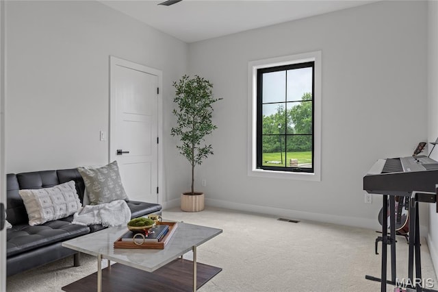 100 Enclave Terrace Ct, Weldon Spring, MO 63304 - living area featuring carpet flooring and baseboards