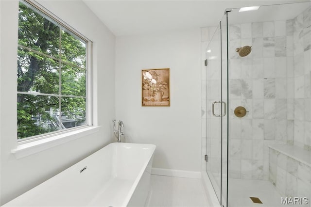 973 Kylemore Dr, Ballwin, MO 63021 - bathroom with a stall shower and a freestanding bath