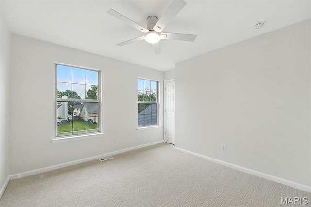 973 Kylemore Dr, Ballwin, MO 63021 - spare room with baseboards, a ceiling fan, a smoke detector, and carpet floors