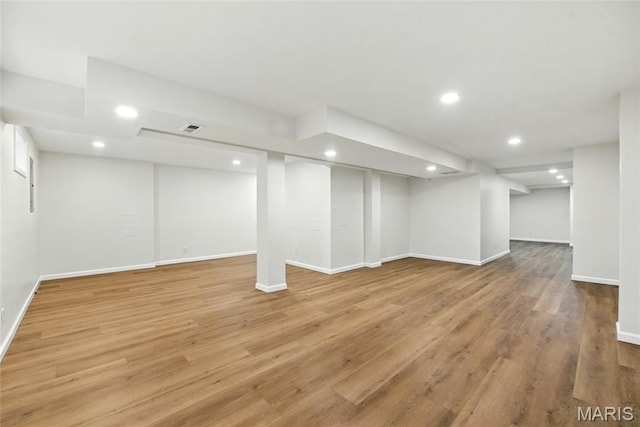 973 Kylemore Dr, Ballwin, MO 63021 - finished below grade area featuring recessed lighting, baseboards, and light wood finished floors