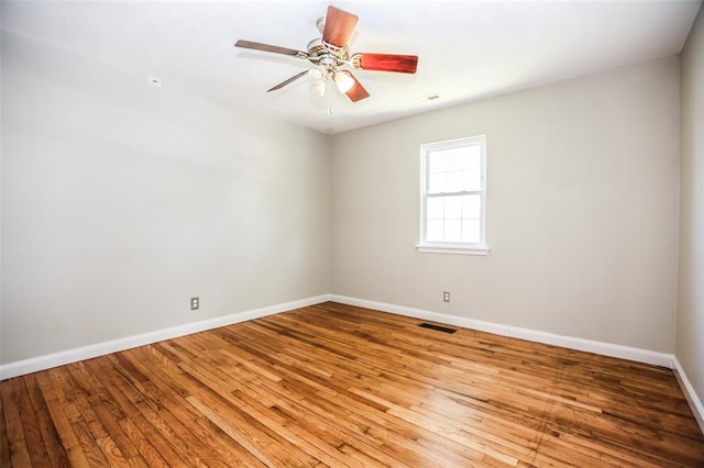 6195 Cedar Springs Rd, Cedar Hill, MO 63016 - unfurnished room featuring baseboards, hardwood / wood-style floors, and ceiling fan