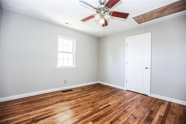 6195 Cedar Springs Rd, Cedar Hill, MO 63016 - empty room featuring attic access, hardwood / wood-style flooring, ceiling fan, and baseboards