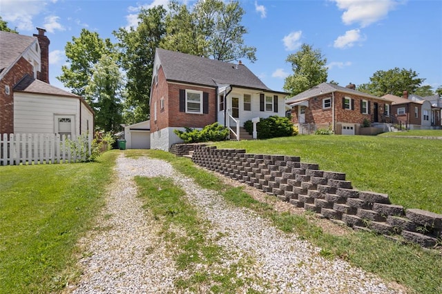 2831 Dunkirk Dr, Saint Louis, MO 63119 - bungalow featuring brick siding, an outdoor structure, and a garage