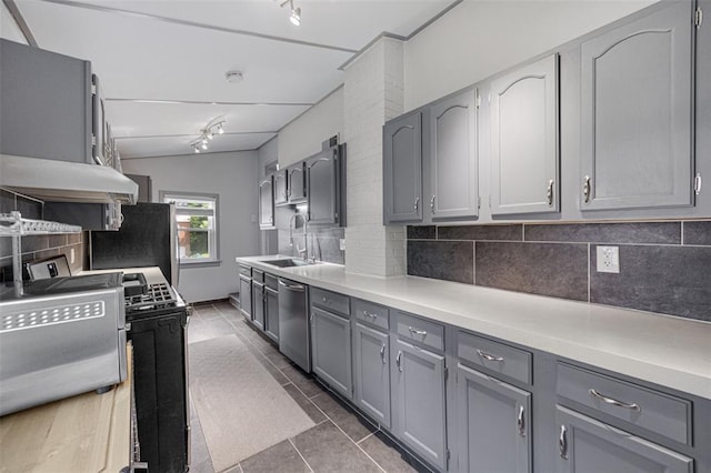 2831 Dunkirk Dr, Saint Louis, MO 63119 - kitchen featuring a sink, appliances with stainless steel finishes, gray cabinetry, and tasteful backsplash