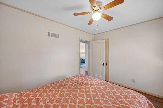 2831 Dunkirk Dr, Saint Louis, MO 63119 - bedroom with ornamental molding, wood finished floors, baseboards, and a ceiling fan