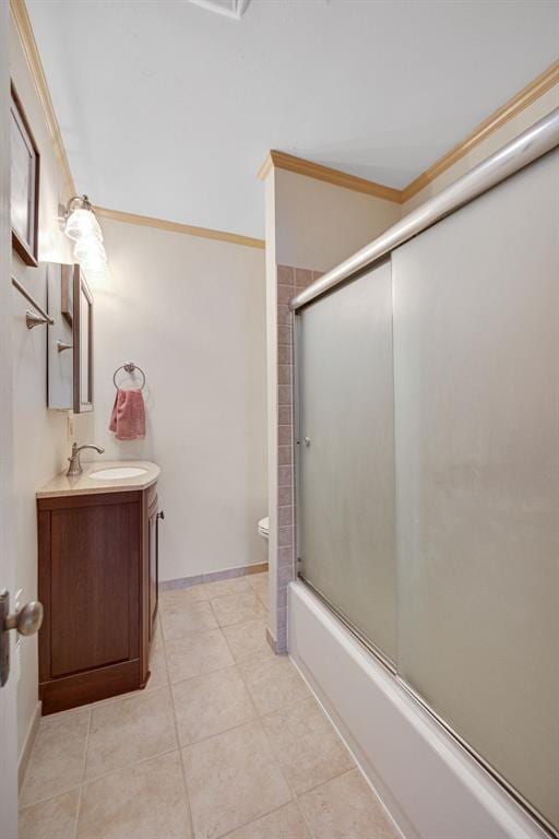2831 Dunkirk Dr, Saint Louis, MO 63119 - bathroom with vanity, crown molding, shower / bath combination with glass door, toilet, and tile patterned flooring