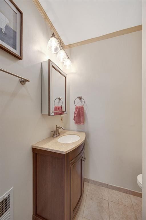 2831 Dunkirk Dr, Saint Louis, MO 63119 - bathroom with vanity, toilet, tile patterned flooring, and baseboards