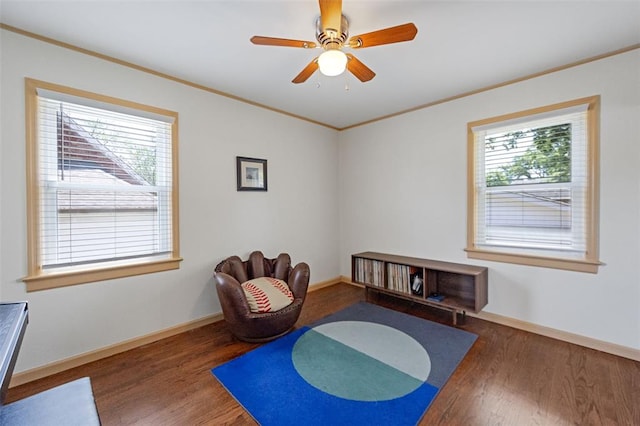 2831 Dunkirk Dr, Saint Louis, MO 63119 - sitting room with ornamental molding, wood finished floors, healthy amount of natural light, and baseboards