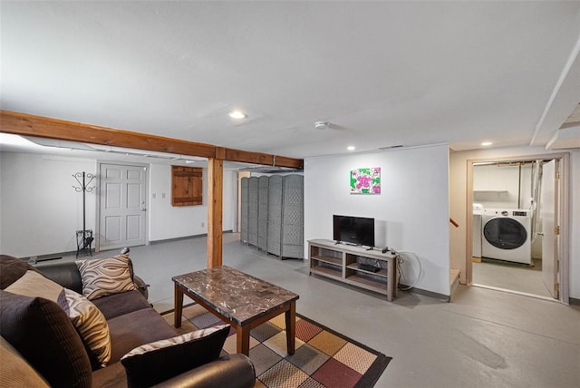 2831 Dunkirk Dr, Saint Louis, MO 63119 - living area featuring washer / dryer, concrete flooring, recessed lighting, and baseboards