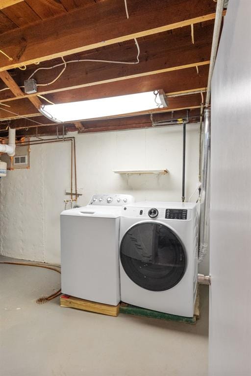 2831 Dunkirk Dr, Saint Louis, MO 63119 - laundry area with washer and clothes dryer