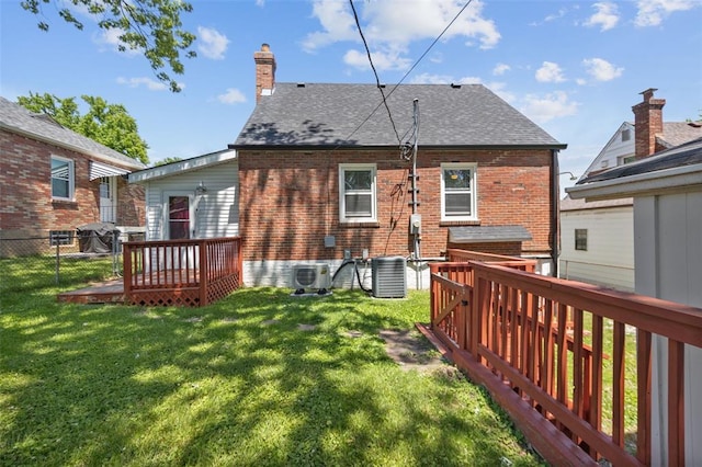 2831 Dunkirk Dr, Saint Louis, MO 63119 - back of house featuring a deck, a cooling unit, brick siding, a chimney, and central AC unit