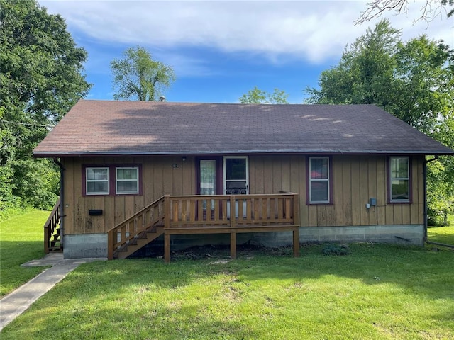 500 E 10th St, Salem, MO 65560 - view of front facade with a front yard, roof with shingles, a deck, and stairway