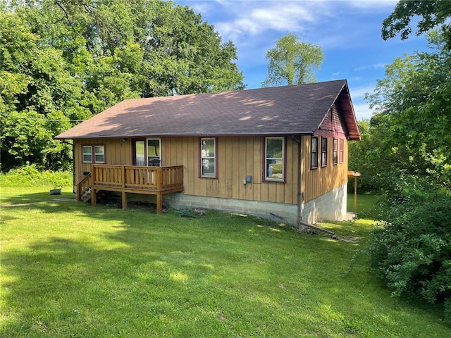 500 E 10th St, Salem, MO 65560 - back of house with roof with shingles, a yard, and a deck