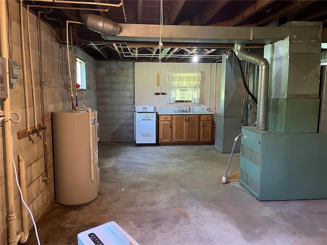 500 E 10th St, Salem, MO 65560 - basement featuring electric water heater, heating unit, and a sink