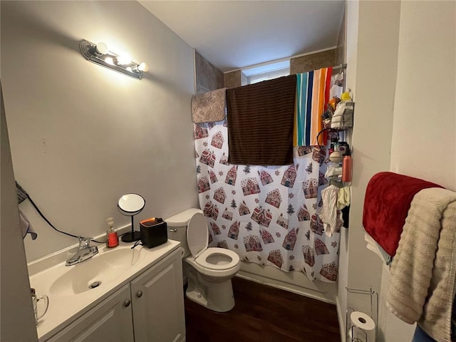 3819 Nebraska Ave, Saint Louis, MO 63118 - full bath featuring toilet, vanity, and wood finished floors
