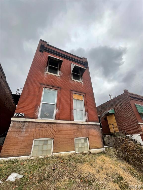 3819 Nebraska Ave, Saint Louis, MO 63118 - view of side of property featuring brick siding