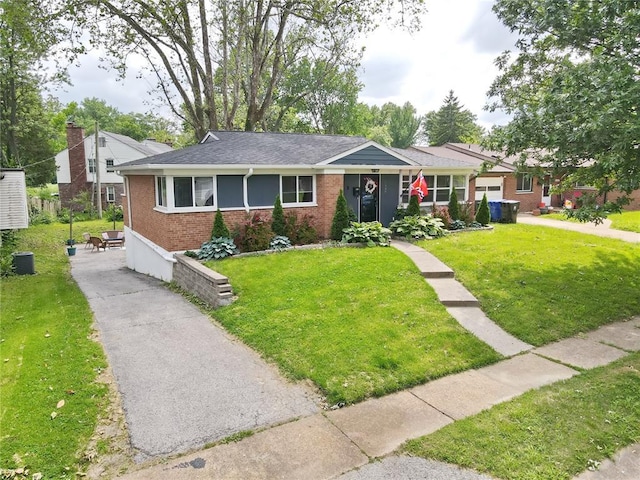 7448 Ahern Ave, Saint Louis, MO 63130 - single story home with brick siding, a front lawn, central AC unit, and a shingled roof