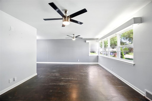 7448 Ahern Ave, Saint Louis, MO 63130 - unfurnished room featuring a ceiling fan, wood finished floors, and baseboards