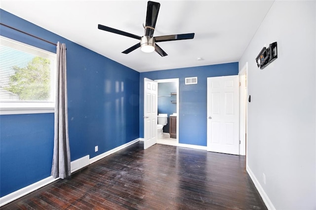 7448 Ahern Ave, Saint Louis, MO 63130 - unfurnished bedroom featuring wood finished floors, baseboards, ensuite bath, and ceiling fan
