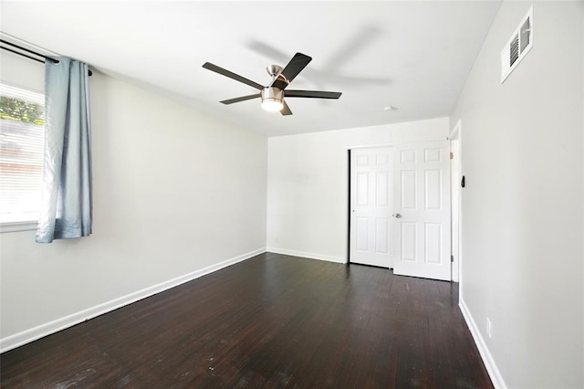 7448 Ahern Ave, Saint Louis, MO 63130 - unfurnished bedroom featuring wood finished floors, baseboards, and a ceiling fan