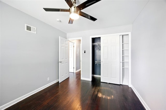 7448 Ahern Ave, Saint Louis, MO 63130 - unfurnished bedroom with wood finished floors, baseboards, a closet, and ceiling fan